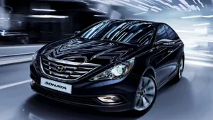 Sleek Hyundai Sonata In Motion Wallpaper