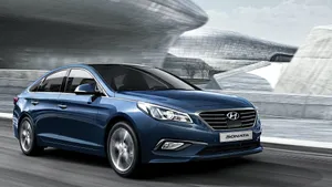 Sleek Hyundai Sonata In Urban Landscape Wallpaper