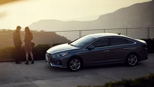 Sleek Hyundai Sonata Parked By The Beach Wallpaper