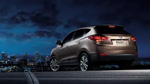 Sleek Hyundai Tucson On The Road Wallpaper