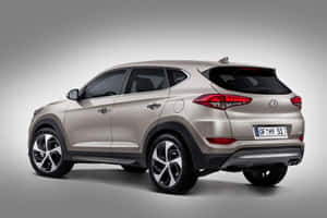 Sleek Hyundai Tucson On The Road Wallpaper