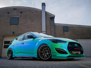 Sleek Hyundai Veloster Cruising The Streets Wallpaper