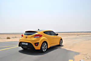 Sleek Hyundai Veloster In A Stunning Urban Landscape Wallpaper