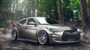 Sleek Hyundai Veloster In Urban Setting Wallpaper