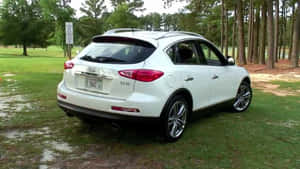 Sleek Infiniti Ex35 Cruising In The City Wallpaper