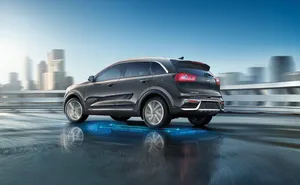 Sleek Kia Niro On The Go Wallpaper