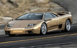 Sleek Lamborghini Diablo On An Open Road Wallpaper