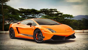 Sleek Lamborghini Gallardo In Motion Wallpaper