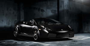 Sleek Lamborghini Gallardo On The Road Wallpaper