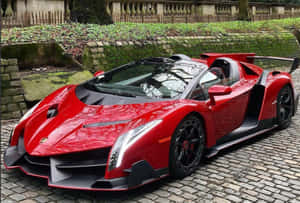 Sleek Lamborghini Veneno On The Race Track Wallpaper