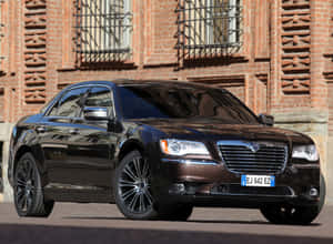 Sleek Lancia Thema In Its Prime Wallpaper