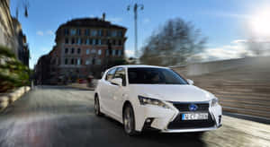 Sleek Lexus Ct 200h Hybrid In A Cityscape Wallpaper