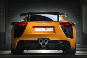 Sleek Lexus Lfa Sports Car On The Road Wallpaper