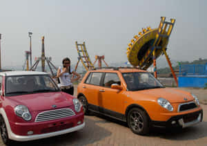 Sleek Lifan 320 Car In Vivid Red Color Wallpaper