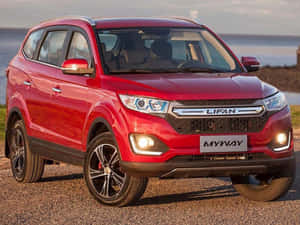 Sleek Lifan Motorcycle Cruising On The Highway Wallpaper