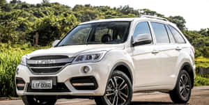 Sleek Lifan Motorcycle On The Road Wallpaper