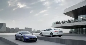 Sleek Maserati Ghibli On The Road Wallpaper