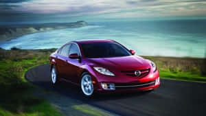 Sleek Mazda 6 In Motion Wallpaper