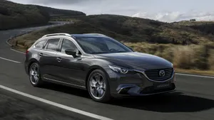 Sleek Mazda 6 In Motion Wallpaper