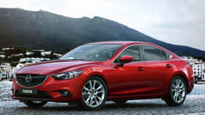 Sleek Mazda 6 Sedan In Motion Wallpaper