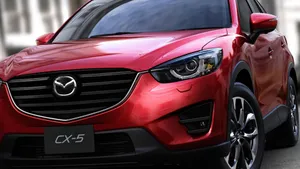 Sleek Mazda Cx-5 In A Vibrant Cityscape Wallpaper