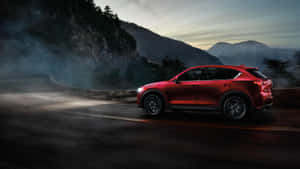 Sleek Mazda Cx-5 In Vibrant Nature Wallpaper