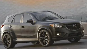 Sleek Mazda Cx-5 Suv In Motion Wallpaper