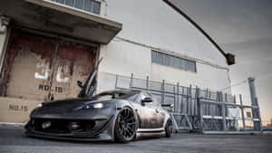 Sleek Mazda Rx-8 Sports Car Wallpaper