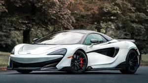 Sleek Mclaren 600lt In Action Wallpaper