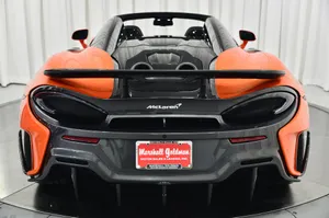 Sleek Mclaren 600lt Spider In Action Wallpaper