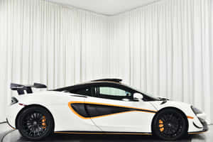 Sleek Mclaren 620r Supercharged Sports Car Wallpaper