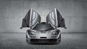 Sleek Mclaren F1 Sports Car On Display In High Resolution Wallpaper