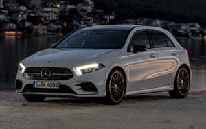 Sleek Mercedes Benz A-class On The Road Wallpaper