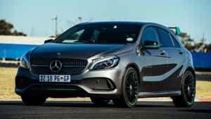 Sleek Mercedes Benz A-class On The Road Wallpaper