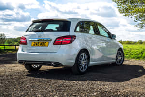 Sleek Mercedes Benz B-class On The Road Wallpaper