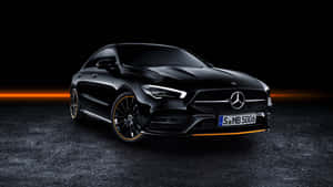Sleek Mercedes Benz Cla-class In A Mesmerizing Night Drive Wallpaper