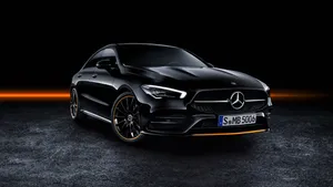 Sleek Mercedes Benz Cla-class In A Mesmerizing Night Drive Wallpaper