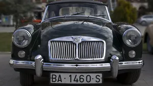 Sleek Metallic Mg Sports Car Wallpaper