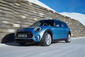 Sleek Mini Cooper S Clubman All4 In Motion Wallpaper
