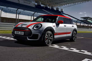 Sleek Mini Cooper S Clubman All4 On The Road Wallpaper