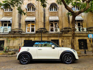 Sleek Mini Cooper S Convertible In Vibrant Red Wallpaper