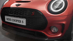 Sleek Mini Cooper S In Vibrant Cityscape Wallpaper