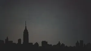 Sleek Minimalist Cityscape In Twilight Glow Wallpaper