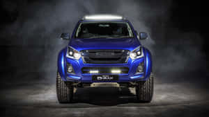 Sleek New Isuzu Truck On The Road Wallpaper