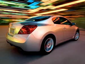 Sleek Nissan Altima In Vivid Colors Wallpaper