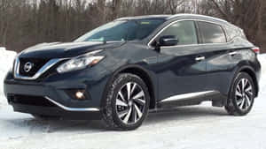 Sleek Nissan Murano Cruising On The Road Wallpaper