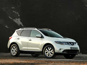 Sleek Nissan Murano On The Open Road Wallpaper