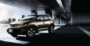 Sleek Nissan Murano Suv On Scenic Roadway Wallpaper