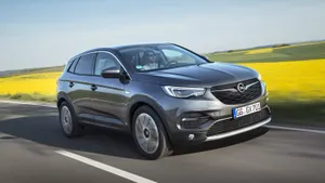 Sleek Opel Grandland X In A Vibrant Setting Wallpaper