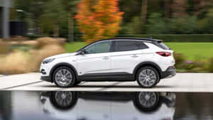 Sleek Opel Grandland X On Scenic Road Wallpaper